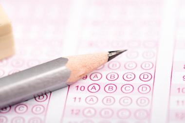 pencil laying on top of bubble test sheet