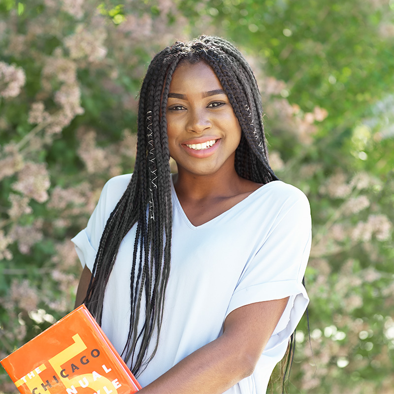 female student holding books